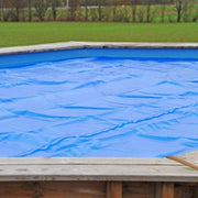 Couverture solaire GRE 400µm pour piscine rectangulaire en bois véritable Carra
